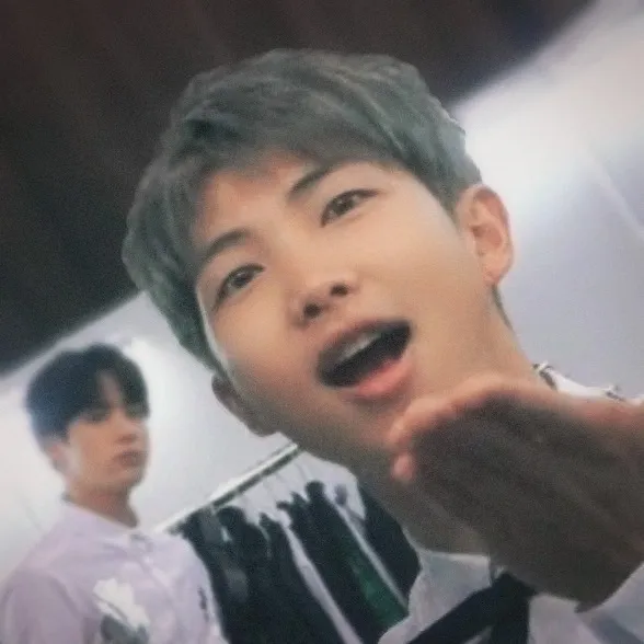 Signature photo of RM (BTS) capturing their charm