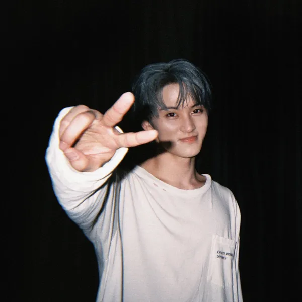 Signature photo of Mark (NCT 127, NCT DREAM) capturing their charm