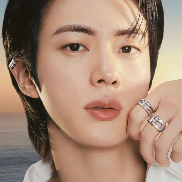 Signature photo of Jin (BTS) capturing their charm