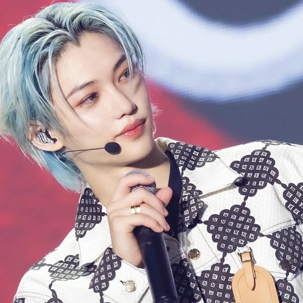 Signature photo of Felix (Stray Kids) capturing their charm