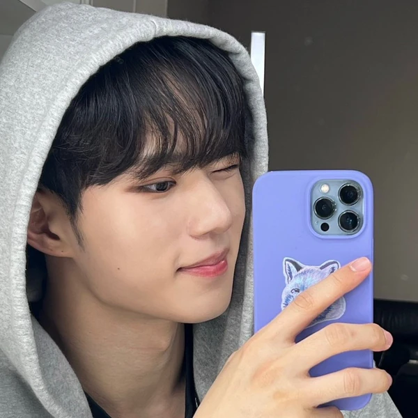 Signature photo of Kim Junseo (WEi) capturing their charm