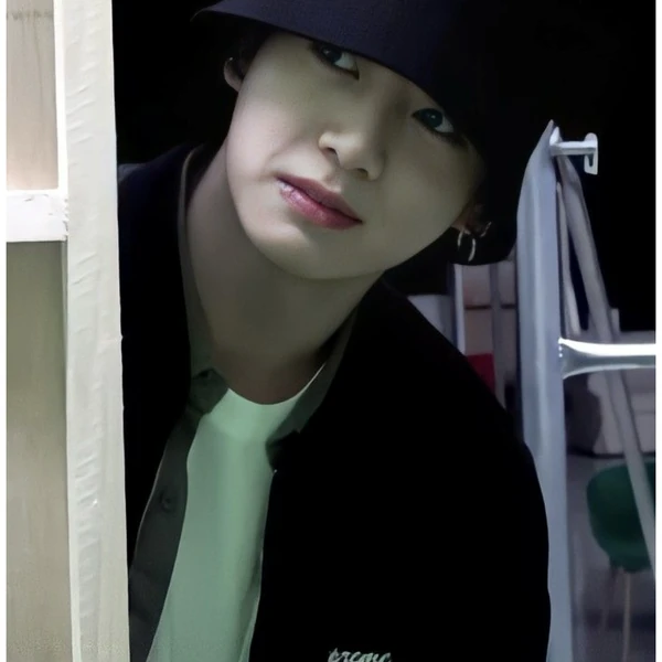 Signature photo of Jungkook (BTS) capturing their charm
