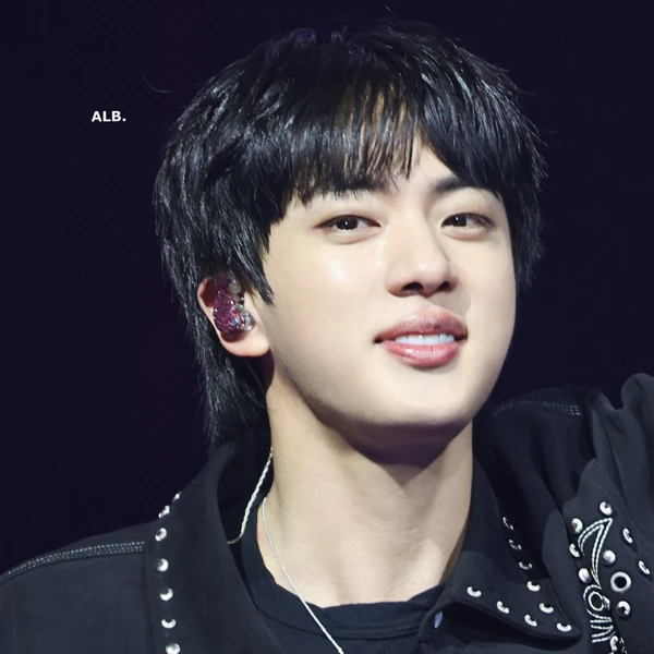 Signature photo of Jin (BTS) capturing their charm