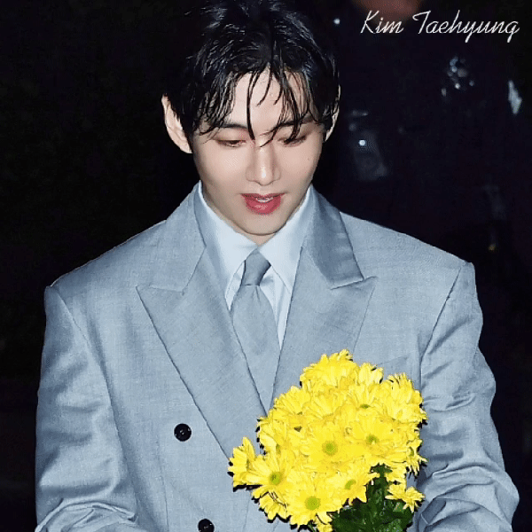 Signature photo of V (BTS) capturing their charm