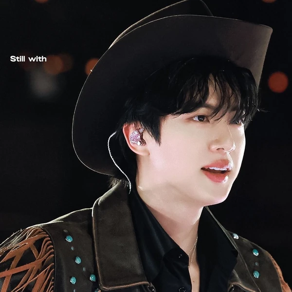 Signature photo of Jin (BTS) capturing their charm