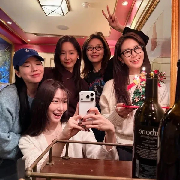 Signature photo of Yoona (Girls' Generation) capturing their charm