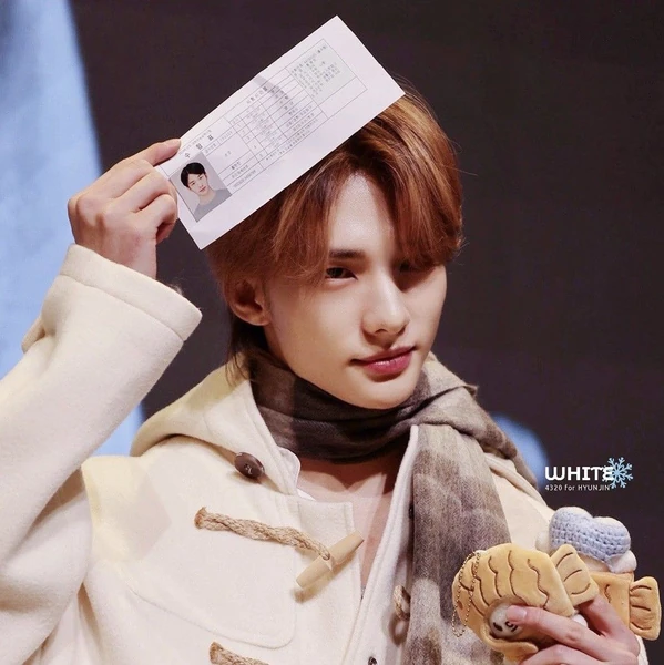 Signature photo of Hyunjin (Stray Kids) capturing their charm