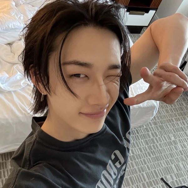 Signature photo of Bang Chan (Stray Kids) capturing their charm