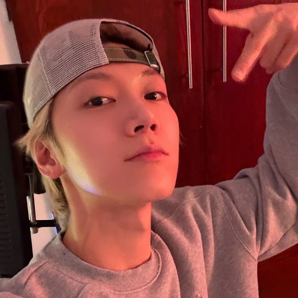 Signature photo of TEN (WayV) capturing their charm