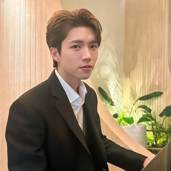 Signature photo of Woohyun (INFINITE) capturing their charm