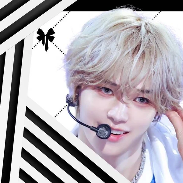 Signature photo of K (&TEAM) capturing their charm