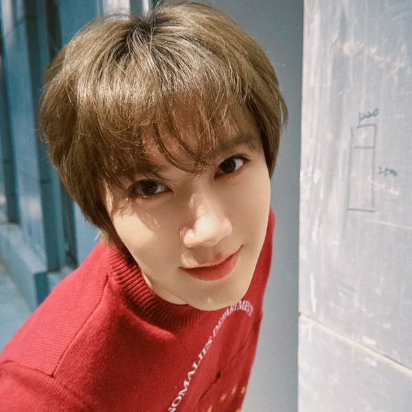 Signature photo of TEN (WayV) capturing their charm