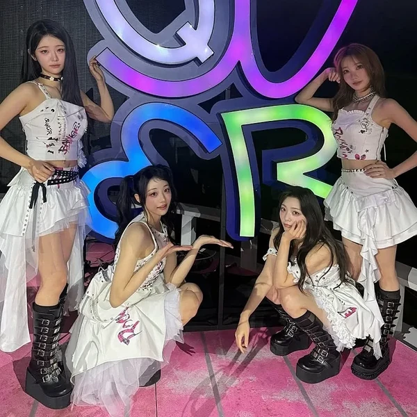 Signature photo of QWER capturing their charm