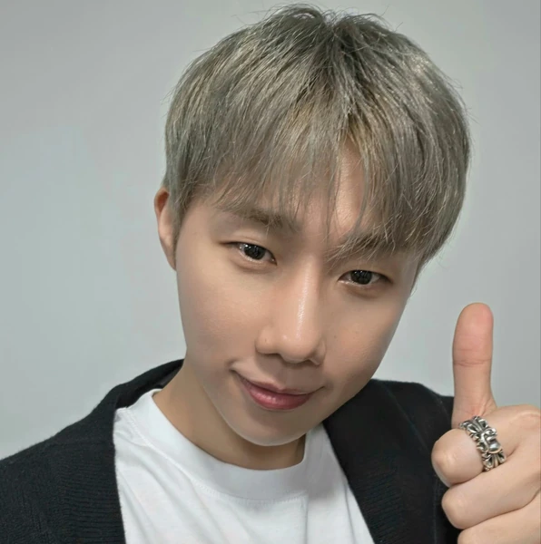 Signature photo of Sungkyu (INFINITE) capturing their charm